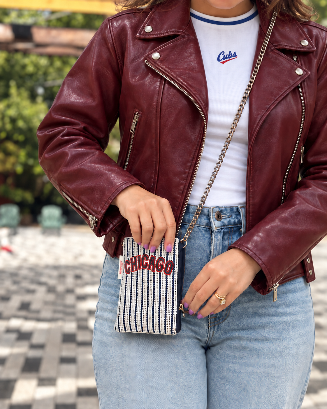 CHICAGO striped beaded cell phone crossbody styled with burgundy leather jacket