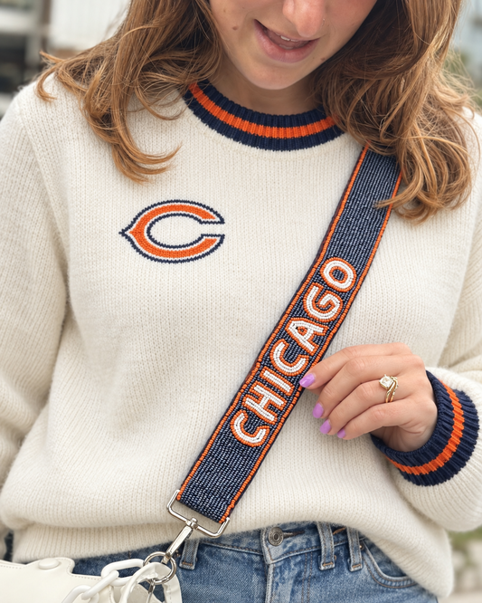 CHICAGO beaded strap styled with a cream Chicago football sweater