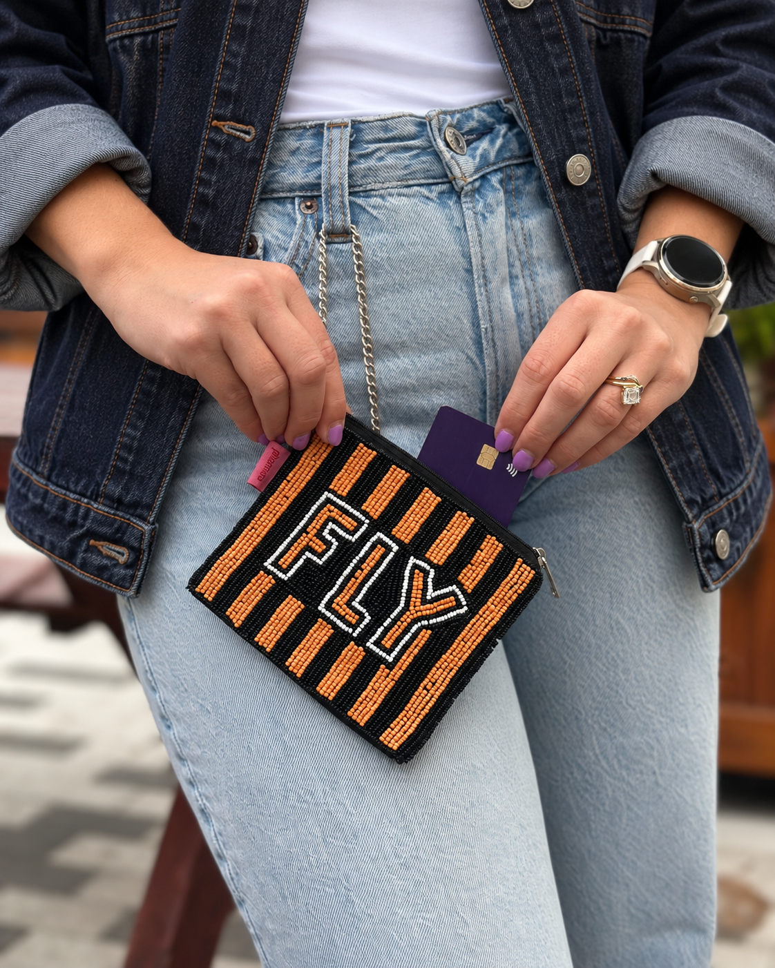 FLY orange black and white beaded coin purse styled with dark denim jacket