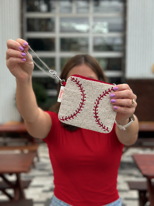 White and red baseball stitch beaded coin purse held up by chain