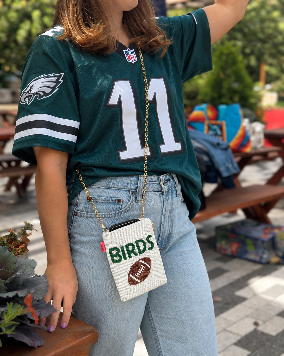 White BIRDS beaded cell phone crossbody styled for Philadelphia football game day