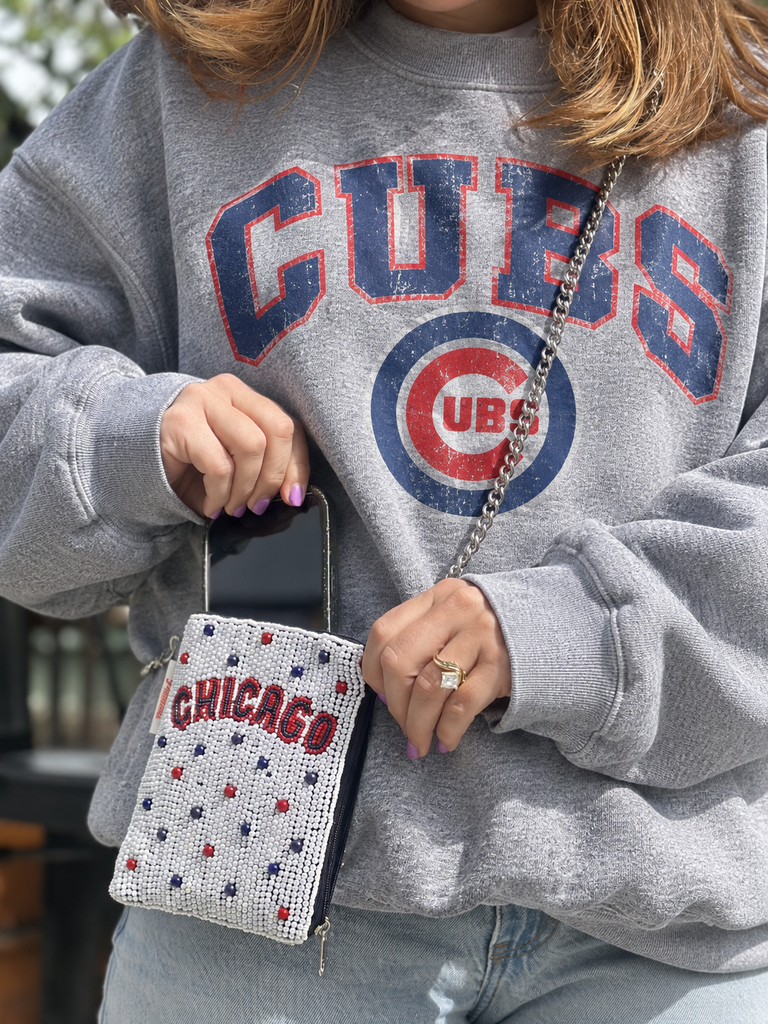 CHICAGO white red and blue beaded cell phone crossbody styled with oversized gray crewneck sweatshirt