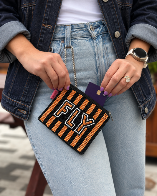 FLY orange black and white beaded coin purse styled with dark denim jacket