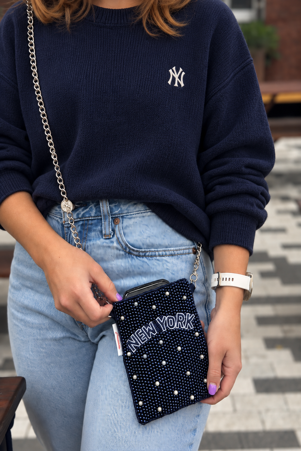 NEW YORK navy beaded cell phone crossbody styled with navy sweater