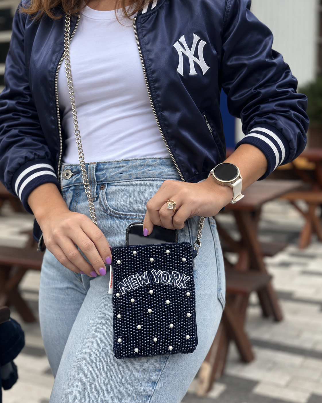 NEW YORK navy beaded cell phone crossbody styled with navy jacket