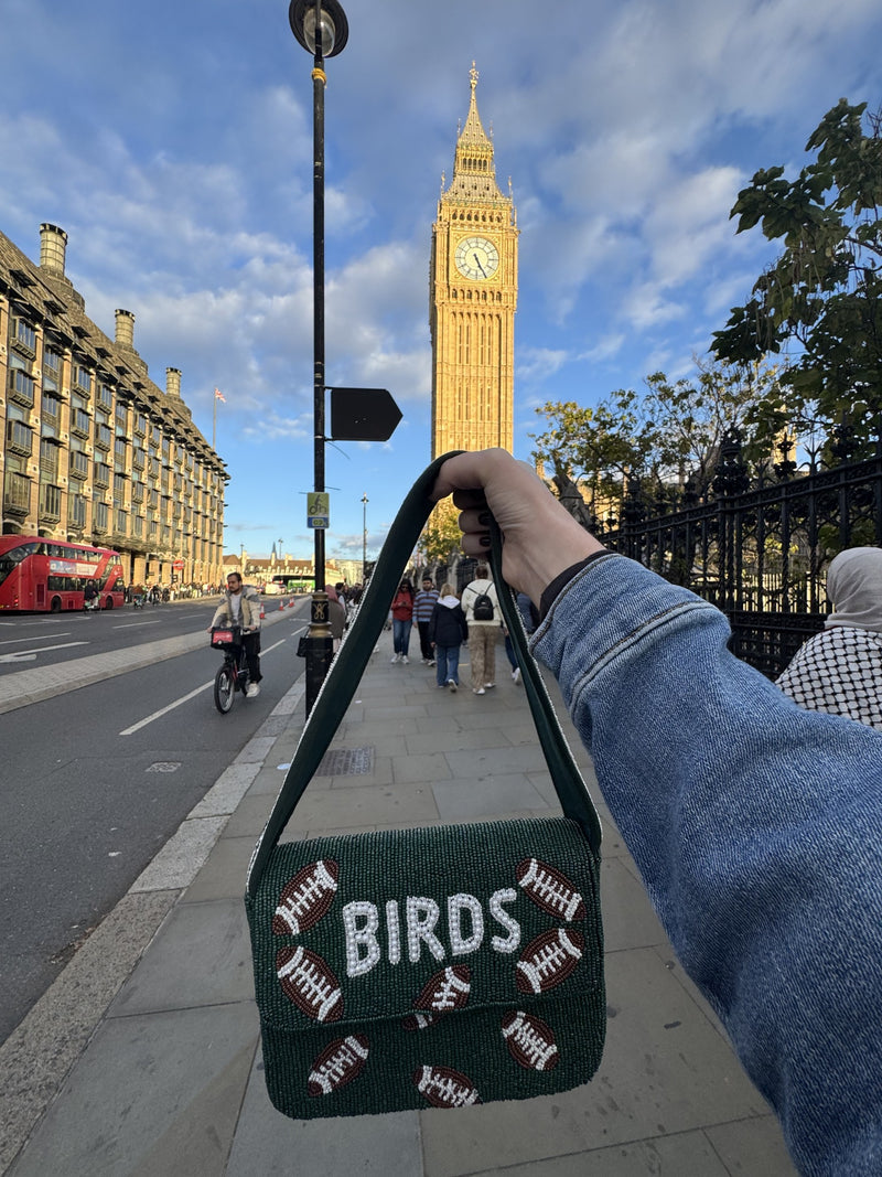Green Phannies BIRDS beaded bag photographed at Big Ben in London