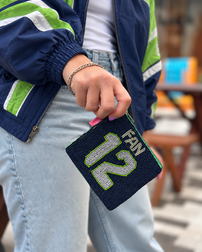 Seattle FAN 12 beaded coin purse styled with navy and green jacket