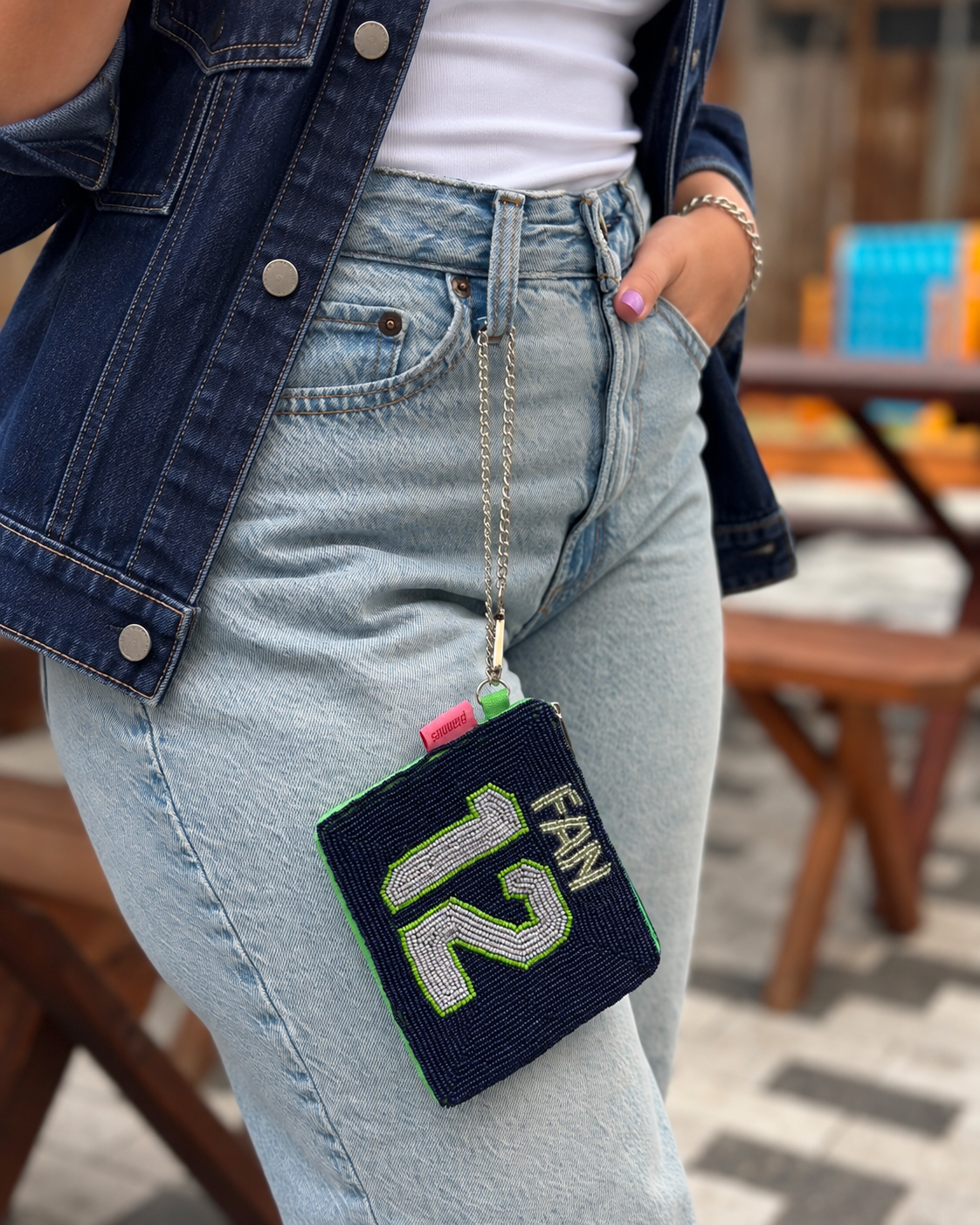Seattle FAN 12 beaded coin purse clipped to jeans with denim jacket
