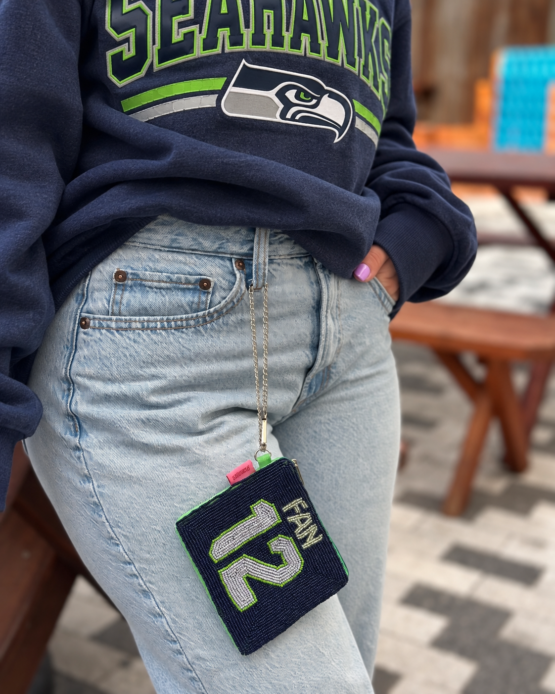 Seattle FAN 12 beaded coin purse styled with navy football sweatshirt