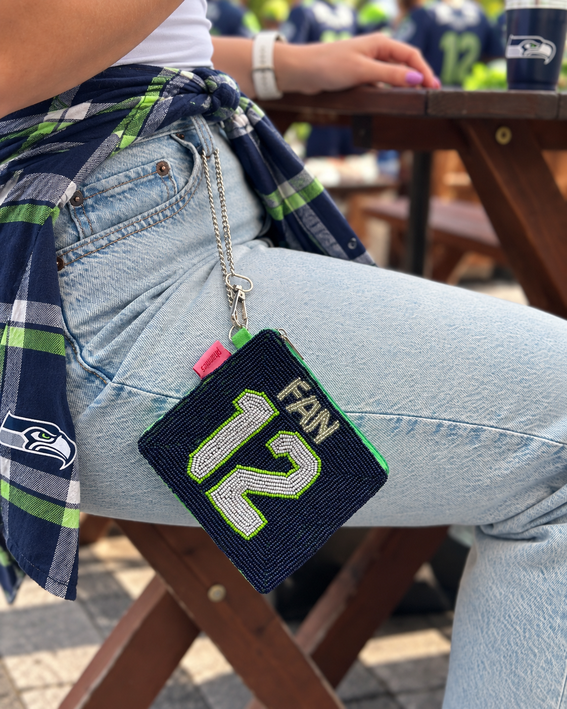 Seattle FAN 12 beaded coin purse styled with plaid shirt at game day table